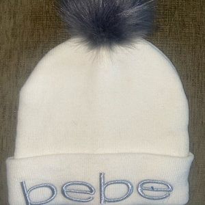 Womens BeBe beanie with grey puff ball